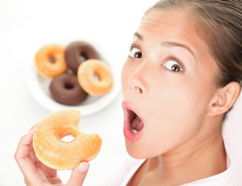 guilty woman eating donut