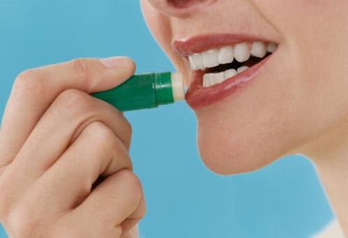 woman applying lip balm1