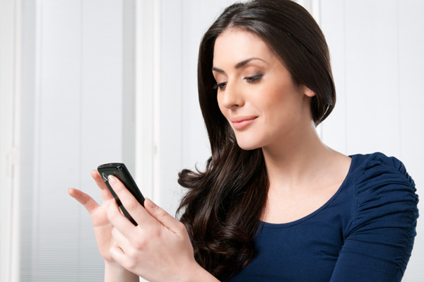 woman organizing contacts on smartphone