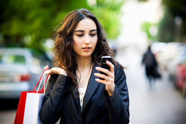 woman running errands smartphone 1