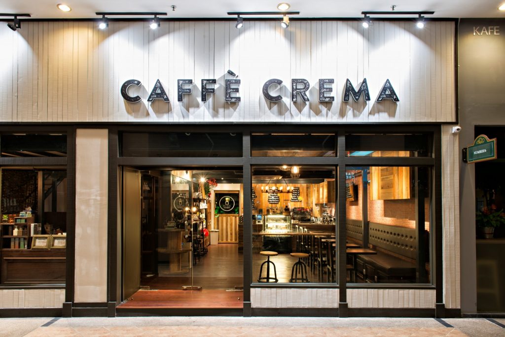 The inviting storefront of Caffe Crema