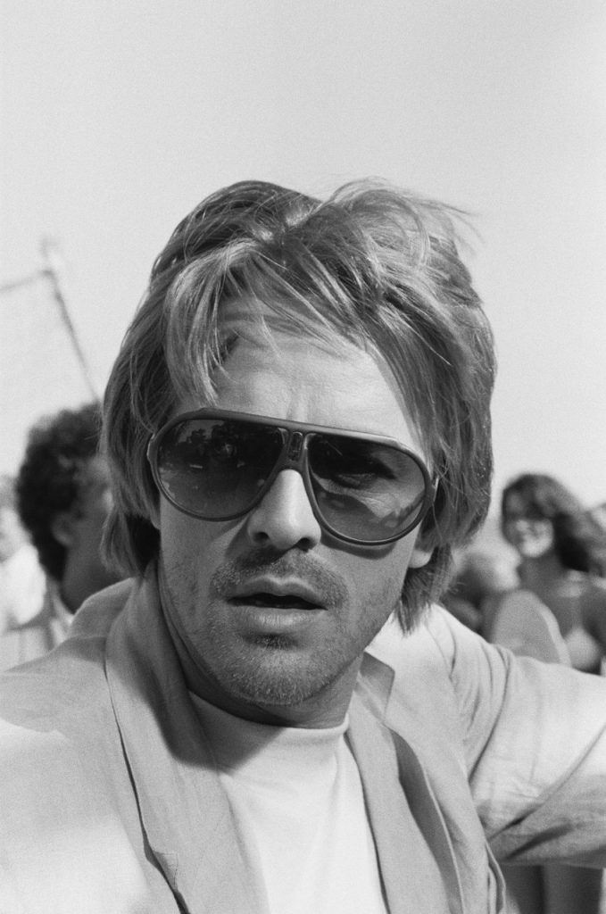 Don Johnson in a scene of the TV Series Miami Vice. USA 1984 Carrera Sunglasses