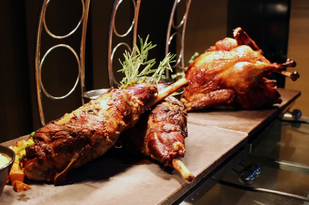 Carving Station - Slow Roasted Bone in Lamb Leg and Roasted Turkey with Dried Fruit Stuffing