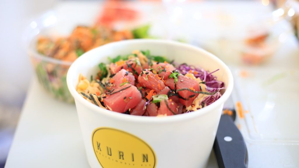 Pokebowl with Salad in the background